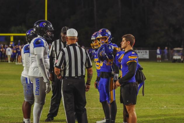 Friday was Senior Night for the Pirates. The Seniors walked arm and arm to midfield to join Senior captains for the coin toss on Oct. 24. Photo by Ashley Chandler/News-Leader