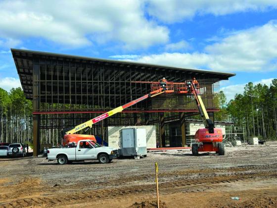 The contractor is installing knotwood siding on the airnasium at the Westside Regional Park. Submitted photo
