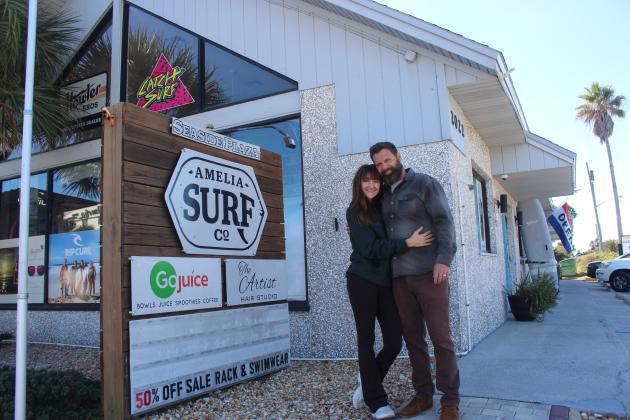 Miranda and Scott Kellogg outside of Amelia Island Surf Co/GoJuice on Wednesday on 1st Avenue. By Marisa DeMar 