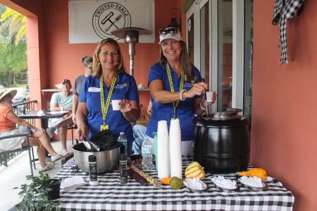 Volunteers from the Fernandina Beach Rotary Club serve homemade tomato soup at Twisted Table during Taste of Amelia on Saturday. Photos by Marisa DeMar/News-Leader 