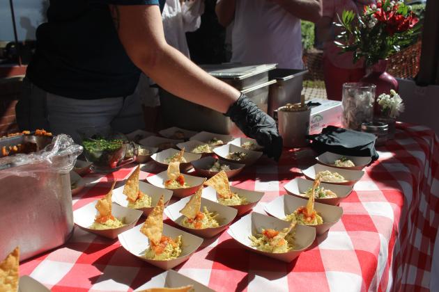 Cafe Karibo presents two different dips outside of the train depot at Taste of Amelia on Saturday.