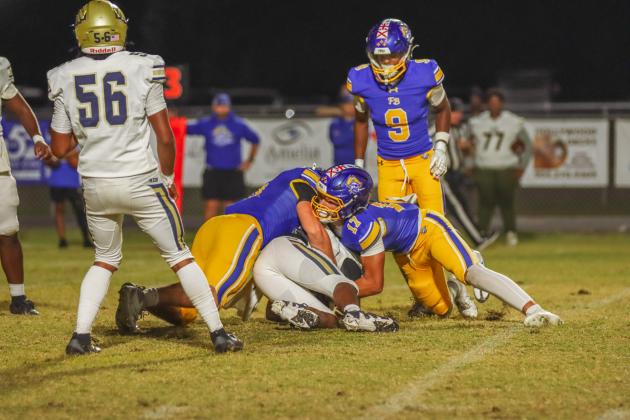 Fernandina Beach Pirates football in the SSAA quarterfinal against Paxon School for Advanced Studies Golden Eagles. Photo by Ashley Chandler/News-Leader