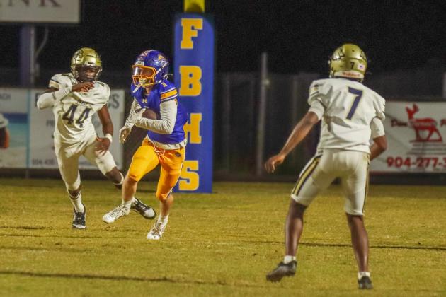 Fernandina Beach Pirates football in the SSAA quarterfinal against Paxon School for Advanced Studies Golden Eagles. Photo by Ashley Chandler/News-Leader