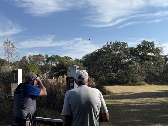 Mike Edwards fires at clay targets at the Sheriff's Shootout Friday at Amelia Shotgun Sports.