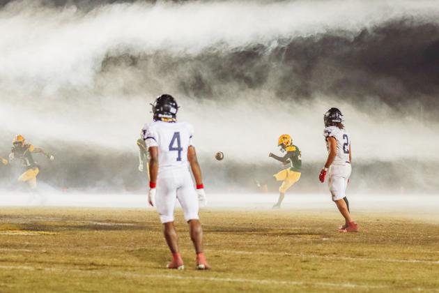 Senior Daniel Armenta kicks off for the Hornets during Friday's playoff game. Photo by Ashley Chandler/News-Leader