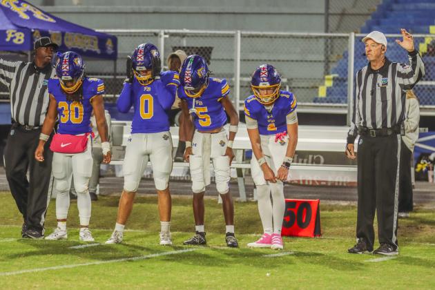 Pirate football captains on Oct. 31. Photo by Ashley Chandler/News-Leader