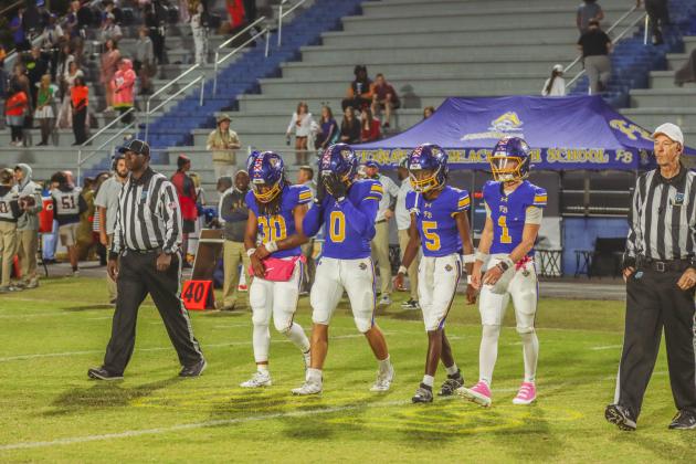 Pirate football captains on Oct. 31. Photo by Ashley Chandler/News-Leader