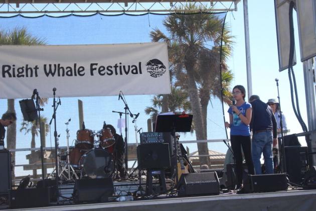 Lidea Clever speaks at the Right Whale Festival on Saturday, Nov. 1, at Main Beach Park in Fernandina Beach. Marisa DeMar/News-Leader