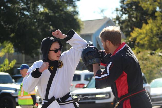 Karate display at the parade. By Marisa DeMar/News-Leader