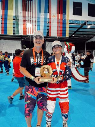 Jaeys and Ray Matz after the junior team took gold. Submitted photo