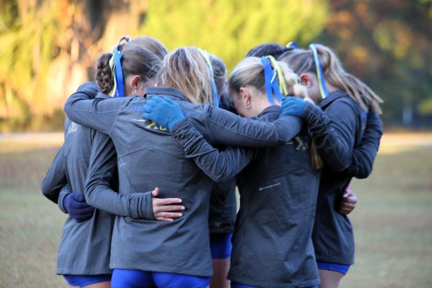 The Fernandina Beach girls cross country team at the FHSAA 2A Region 1 meet. Photo by Stephanie Nichols