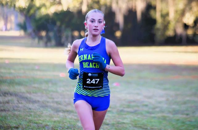 Fernandina Beach girls cross country in the FHSAA 2A Region 1 meet. Photo by Stephanie Nichols