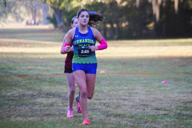 Fernandina Beach girls cross country in the FHSAA 2A Region 1 meet. Photo by Stephanie Nichols