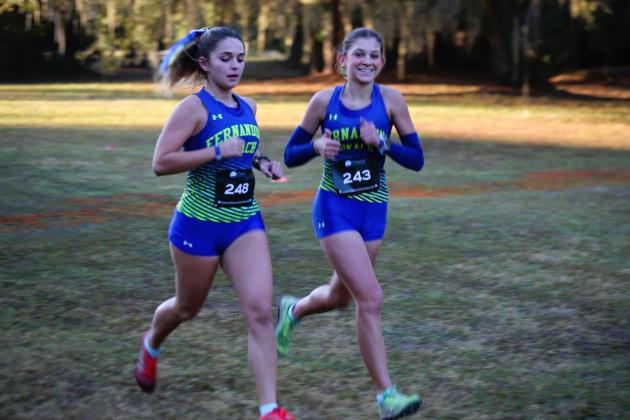 Fernandina Beach girls cross country in the FHSAA 2A Region 1 meet. Photo by Stephanie Nichols
