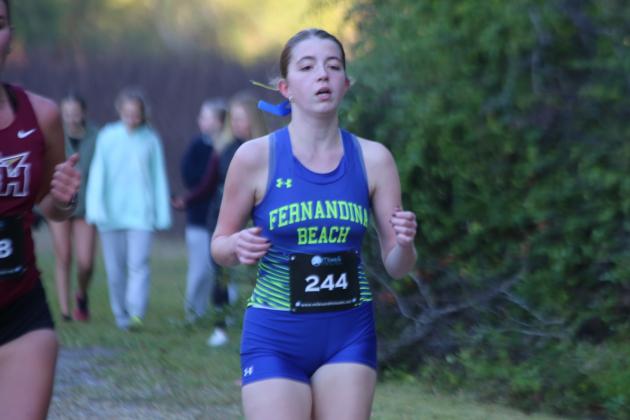 Fernandina Beach girls cross country in the FHSAA 2A Region 1 meet. Photo by Stephanie Nichols