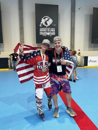 Jaeys and Ray Matz after the junior team took gold. Submitted photo