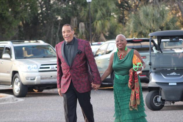 Photo 1: A couple enters the 90th Anniversary of American Beach Gala at the Amelia River Club on Dec. 27. Photos by Marisa DeMar