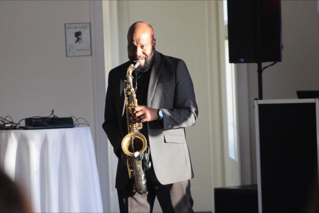 Pierre Kendrick plays smooth jazz on the saxophone for guests of the gala on Dec. 27. Photos by Marisa DeMar