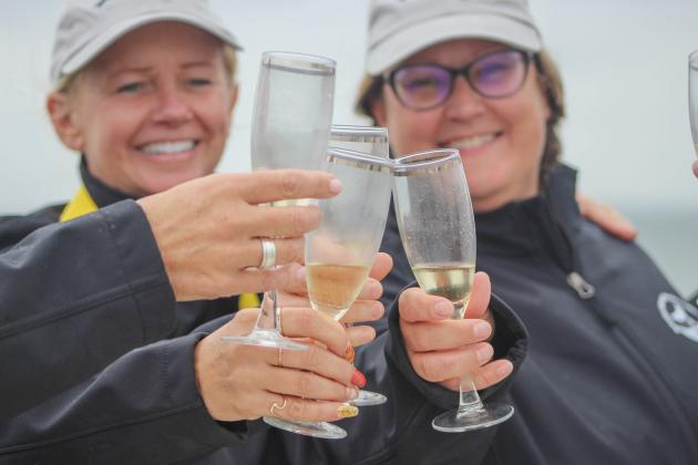 Amelia Island Whale Ambassadors celebrate the first whale sighting at the Seaside Amelia Inn on Tuesday, Dec. 2. By Marisa DeMar
