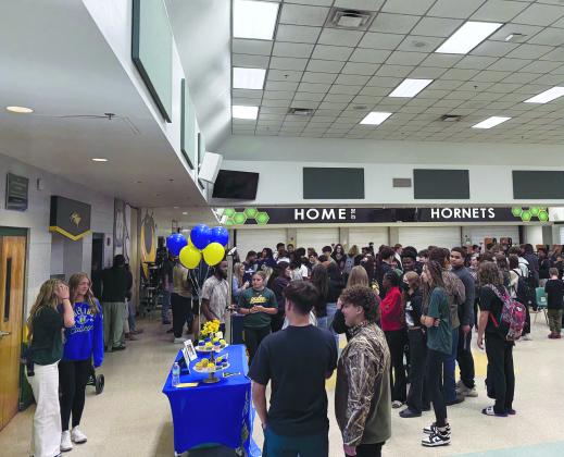 Photo by Nick Blank/ A crowd packed into Yulee High School's cafeteria Wednesday for National Signing Day.