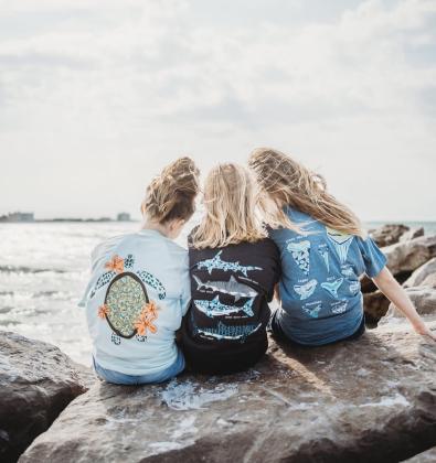 Kids model The Happy Sea merchandise. 