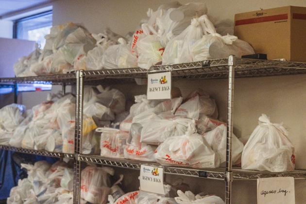 Food is bagged and ready to be passed out Monday at the Barnabas Center in Fernandina Beach. Photo by Ashley Chandler/News-Leader