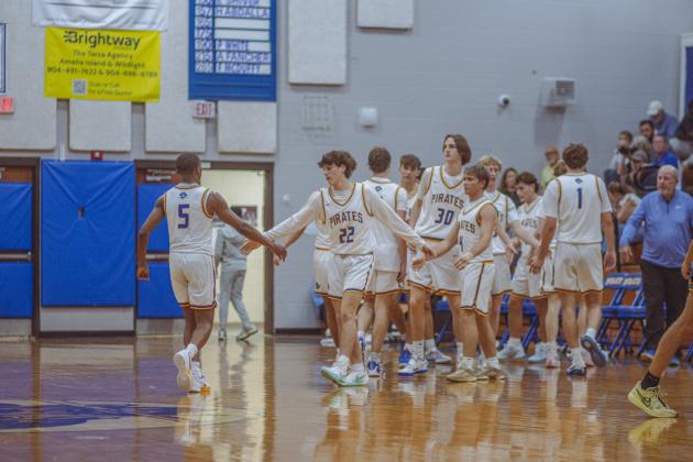 The boys varsity basketball teams from Fernandina beach and Yulee high school faced off in Fernandina Beach on Dec. 5. Photo by Ashley Chandler/News-Leader