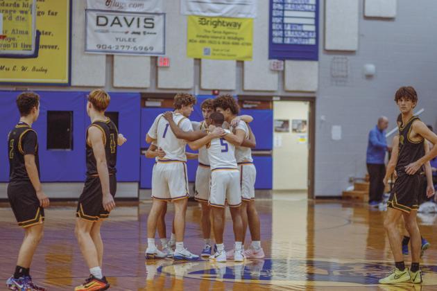 The boys varsity basketball teams from Fernandina beach and Yulee high school faced off in Fernandina Beach on Dec. 5. Photo by Ashley Chandler/News-Leader