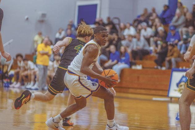The boys varsity basketball teams from Fernandina beach and Yulee high school faced off in Fernandina Beach on Dec. 5. Photo by Ashley Chandler/News-Leader