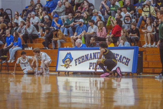 The boys varsity basketball teams from Fernandina beach and Yulee high school faced off in Fernandina Beach on Dec. 5. Photo by Ashley Chandler/News-Leader