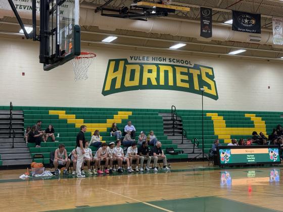 Yulee Head Coach Connor Wetmore watches a game unfold