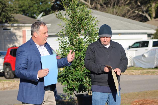 Vice Mayor Darron Ayscue and David Neville give the proclamation speech. By Marisa DeMar/News-Leader