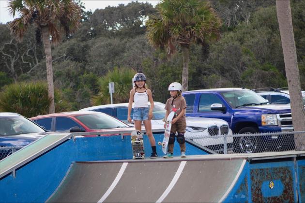 Coco and her sister Prim practice their skills at the Poe Pinson Skate Park in Fernandina Beach on Jan. 10.  By Marisa DeMar/News-Leader