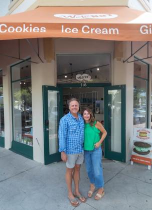 Brian Kyzer and Kam Kyzer pose outside of the WataNut retail store on Centre Street in Fernandina Beach. Submitted photo