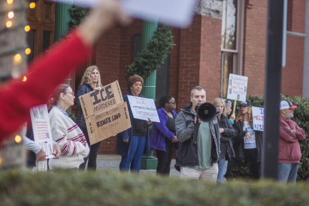 Local demonstrators protest the actions of an ICE agent in Minneapolis last week in front of the Downtown Historic Courthouse. Photo by Ashley Chandler/News-Leader