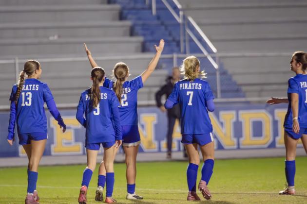 Sarah Benjamin celebrates a goal following her game-winning penalty kick during Wednesday’s District Championship. Nick Blank/News-Leader