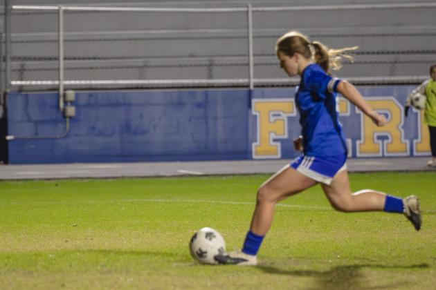 Sarah Benjamin takes the game-winning penalty kick during Wednesday’s District Championship. Nick Blank/News-Leader