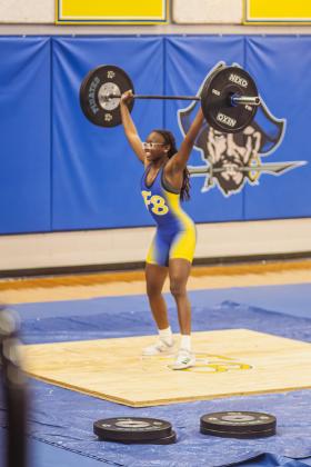 Passion Roberts lifts at a competition Jan. 6 at FBHS. Photo by Ashley Chandler/News-Leader