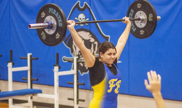 The Pirate girls weightlifting team competed against West Nassau earlier this month. Photo by Ashley Chandler/News-Leader