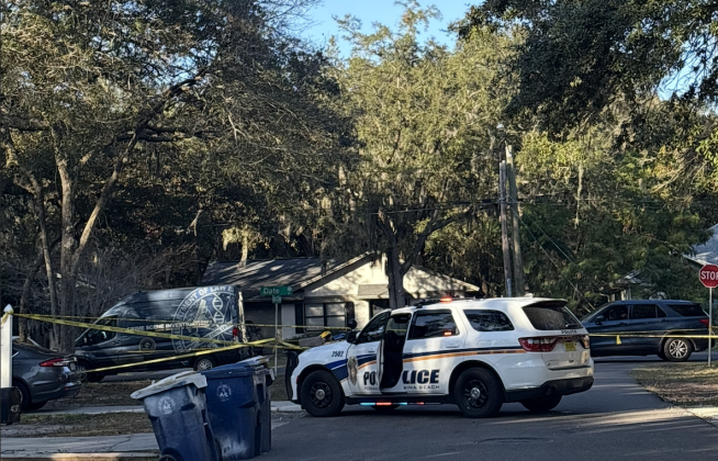 Police investigate a shooting near South 13th Terrace and Date Street Tuesday. Photo by Marisa DeMar/News-Leader