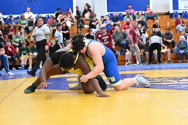 Pirate Beau Brazzeal, right, and Hornet Moises Jean-Baptiste wrestle at the District Duals on Jan. 6 at Fernandina Beach High. Submitted photo