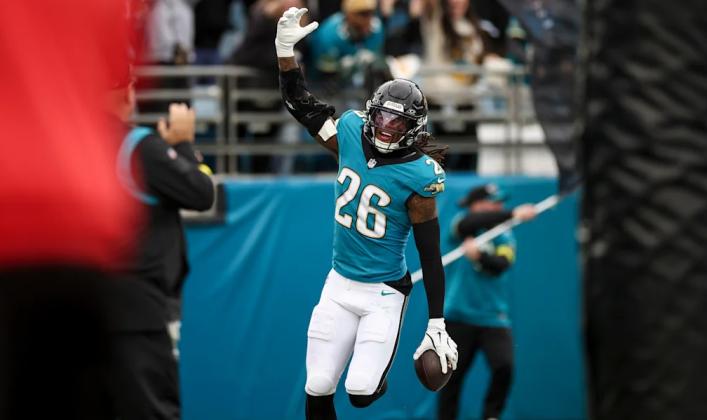 Jacksonville safety Antonio Johnson celebrates after intercepting a pass by Titans’ Brandon Allen and taking it for a touchdown. Photo courtesy of Jacksonville Jaguars