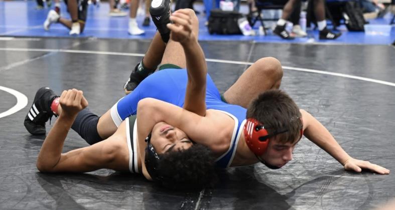 Pirate Jayden Holmes competes over winter break. Photos courtesy of Eric Kubatzke