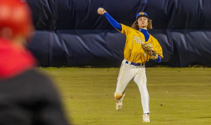 Landen Holbrook throws the ball from the outfield on Feb. 13. Photo by Ashley Chandler/News-Leader