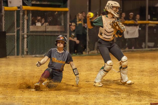 YHS and WNHS softball faced off in Yulee on Feb. 19. The Warriors beat the Hornets 4-0. Photo by Ashley Chandler/News-Leader