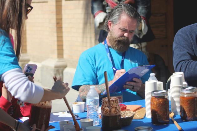 David Nunimaker judges at the Amelia Island Montessori School's 17th annual Chili Cook-Off. By Marisa DeMar/News-Leader