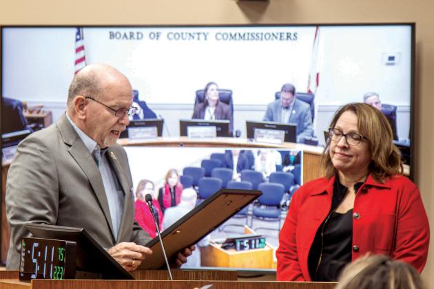 Commissioner John Martin presents a proclamation designating Thursday as Human Trafficking Awareness and Identification Day in Nassau County to Dea Sims, Chair of the Jacksonville Women’s Network Speaker’s Forum, and Cheryl Munn, communications committee of the Jacksonville Women’s Network, at Monday’s Board of County Commissioners meeting. Ashley Chandler/News-Leader