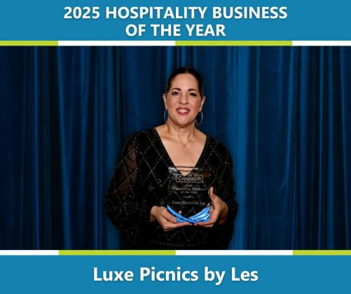 Leslie Diaz holds her Hospitality Business of the Year award at the annual Chamber Awards & Gala on Jan. 15. Courtesy of the Nassau County Chamber of Commerce 