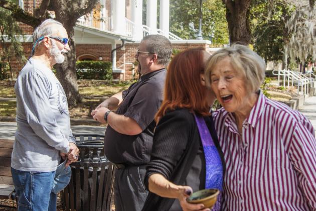 At left, Pastor John Benjamin Mandrick of Prince of Peace Lutheran Church applies the imposition of the ashes Wednesday in downtown Fernandina Beach. Photo by Ashley Chandler/News-Leader