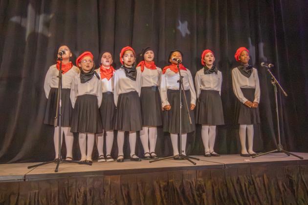 Members of the Nassau County Boys and Girls Club Choir perform for attendees of their 19th annual gala at the Ritz Carlton on Saturday.  By Marisa DeMar/News-Leader 